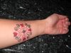 love heart tattoo on hand
